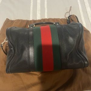 Gucci leather Boston bag with green/ red detail and long leather strap.